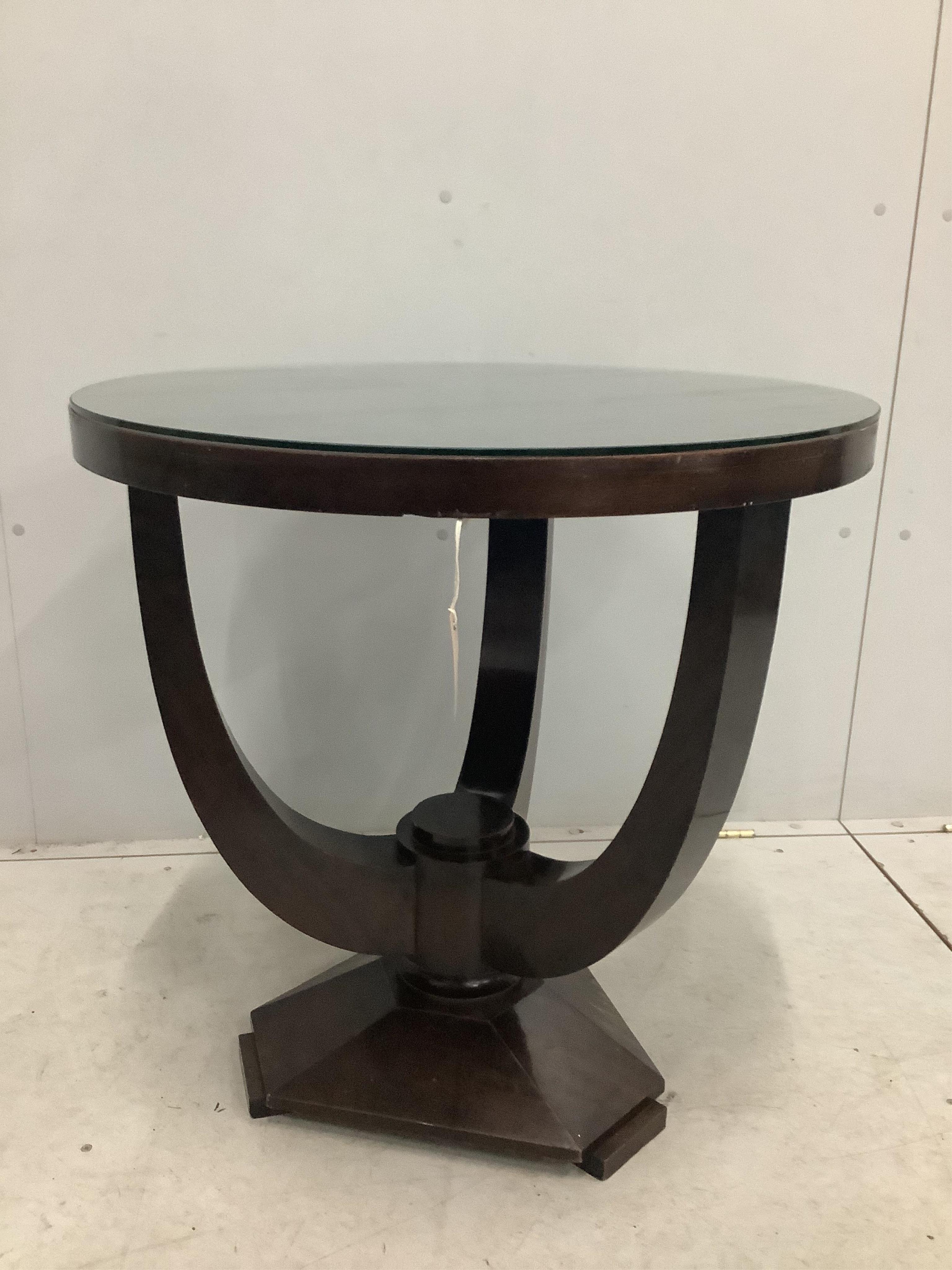 An Art Deco circular mahogany occasional table, diameter 70cm, height 71cm. Condition - fair